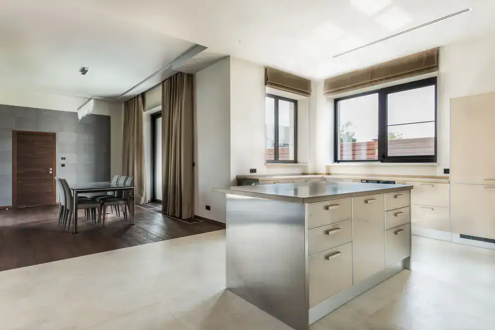 Large floor tiles seamlessly connecting a living space